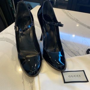 Black Gucci heels with strap . Both dust bags . Great condition.